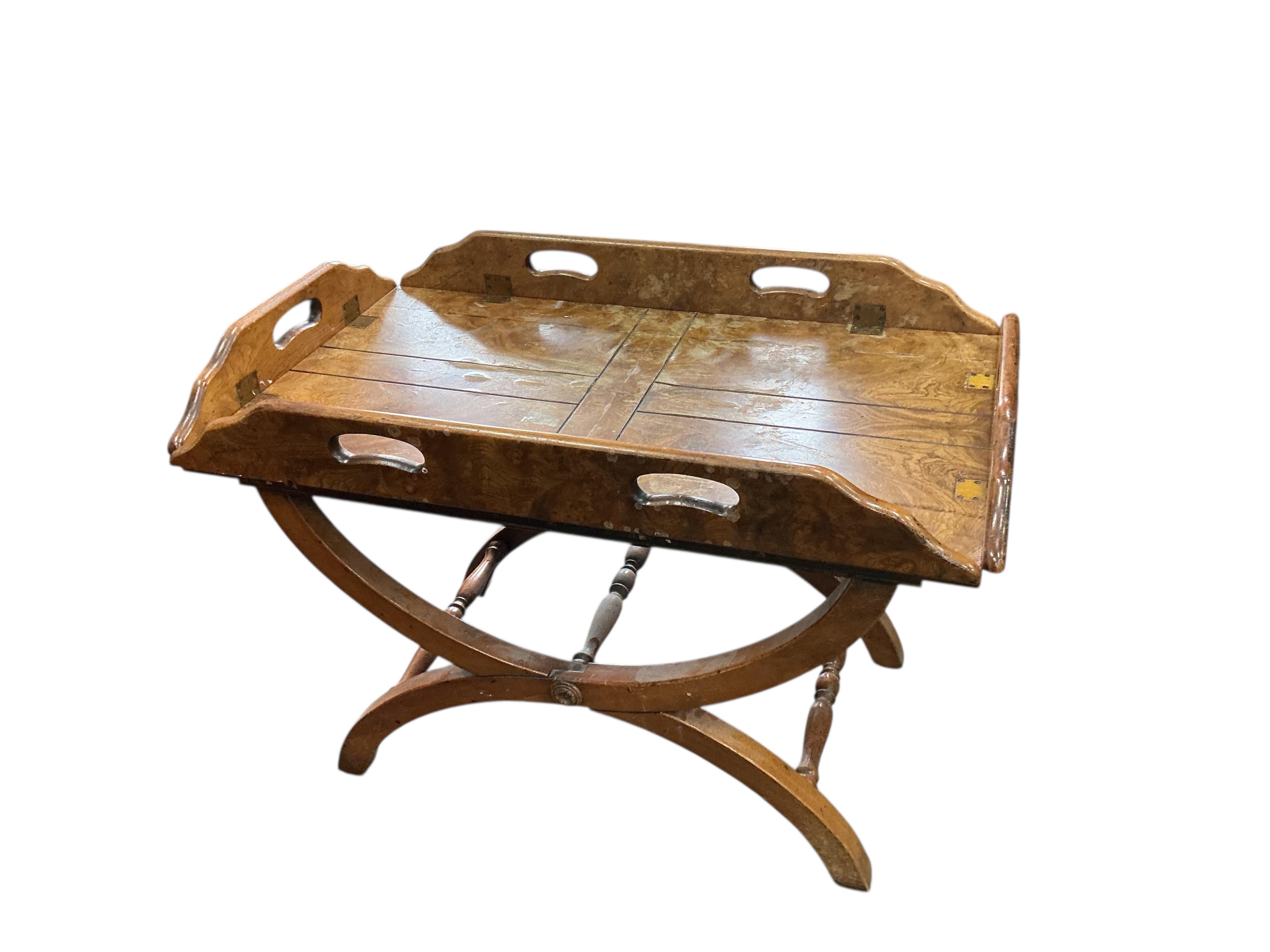 A reproduction burr oak folding butler’s tray on stand, width 84cm, depth 54cm, height 58cm